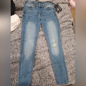 True Religion Skinny Jeans with Distressed Fading